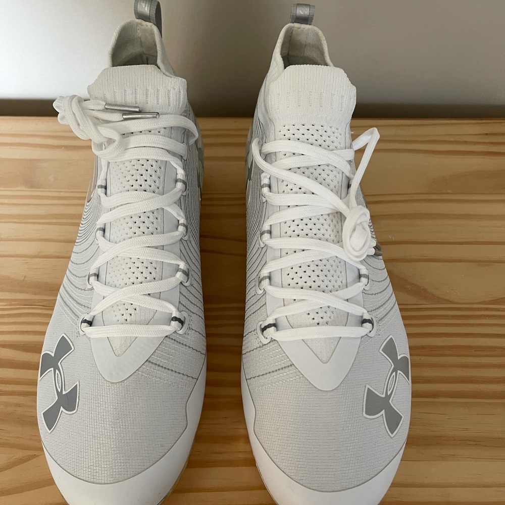 Brand new Under Armour cleats size 11